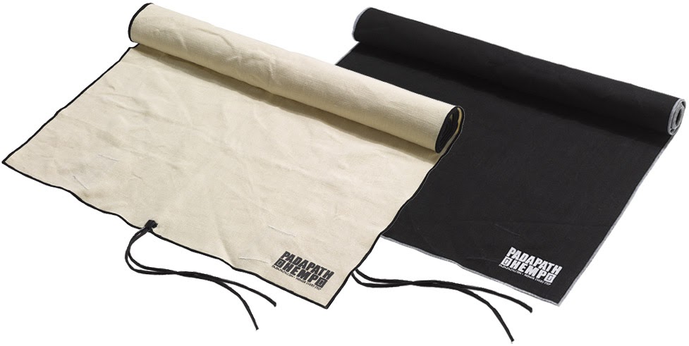 Two PadaPath Hemp Hot Yoga Towels in black hemp and natural hemp